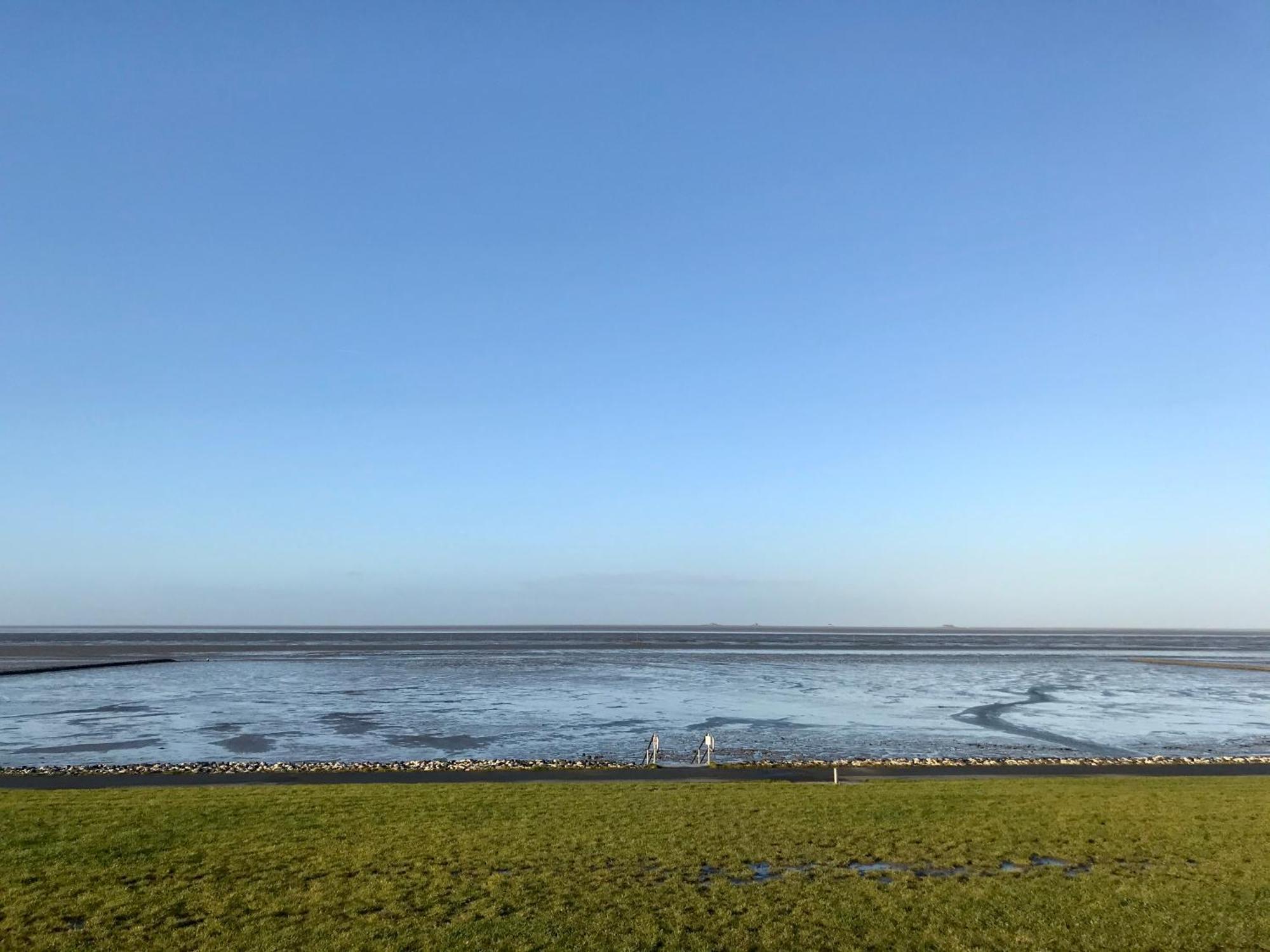 Gemuetliches Ferienhaus Hinterm Deich Nordstrand Bagian luar foto